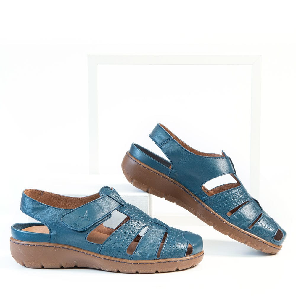 http://shop.soletosoulfootwear.com/cdn/shop/products/portofino-sandals-portofino-womens-fisherman-sandals-indigo-blue-38950283280599_1200x1200.jpg?v=1678919324